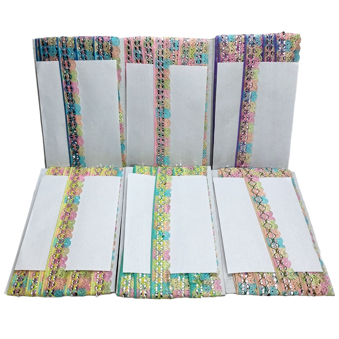 Set of stationery items with colorful decorative borders on a white background