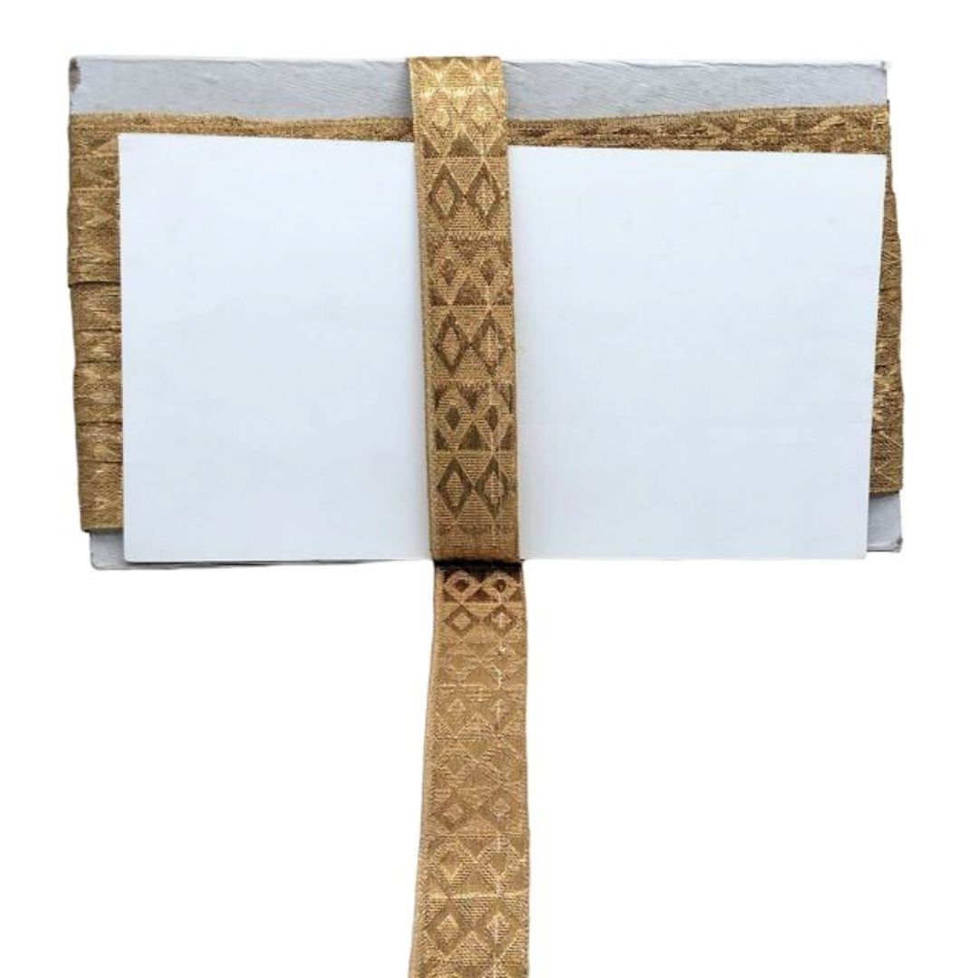 White card with a decorative brown ribbon on a white background