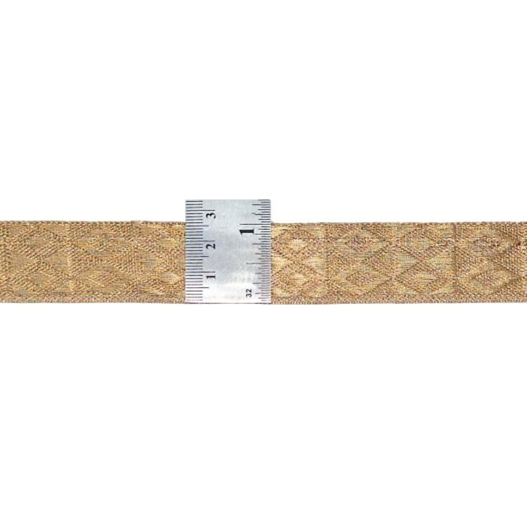 Textured beige ribbon with a silver measuring tape on a white background