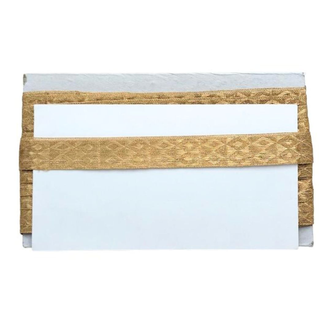 Rectangular cardholder with gold patterned flap on a white background