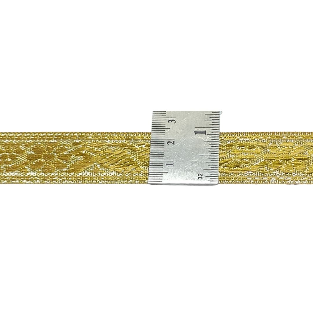 Gold ribbon with a silver measuring tape on a white background