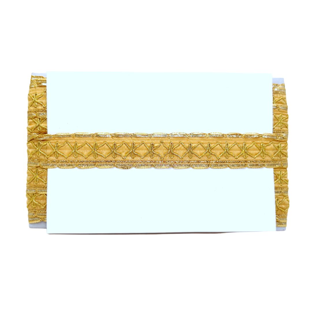 Decorative gold table runner with a white background