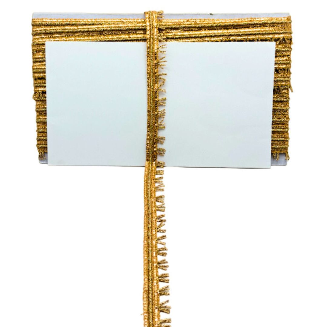 Gold-framed mirror with decorative trim on a white background