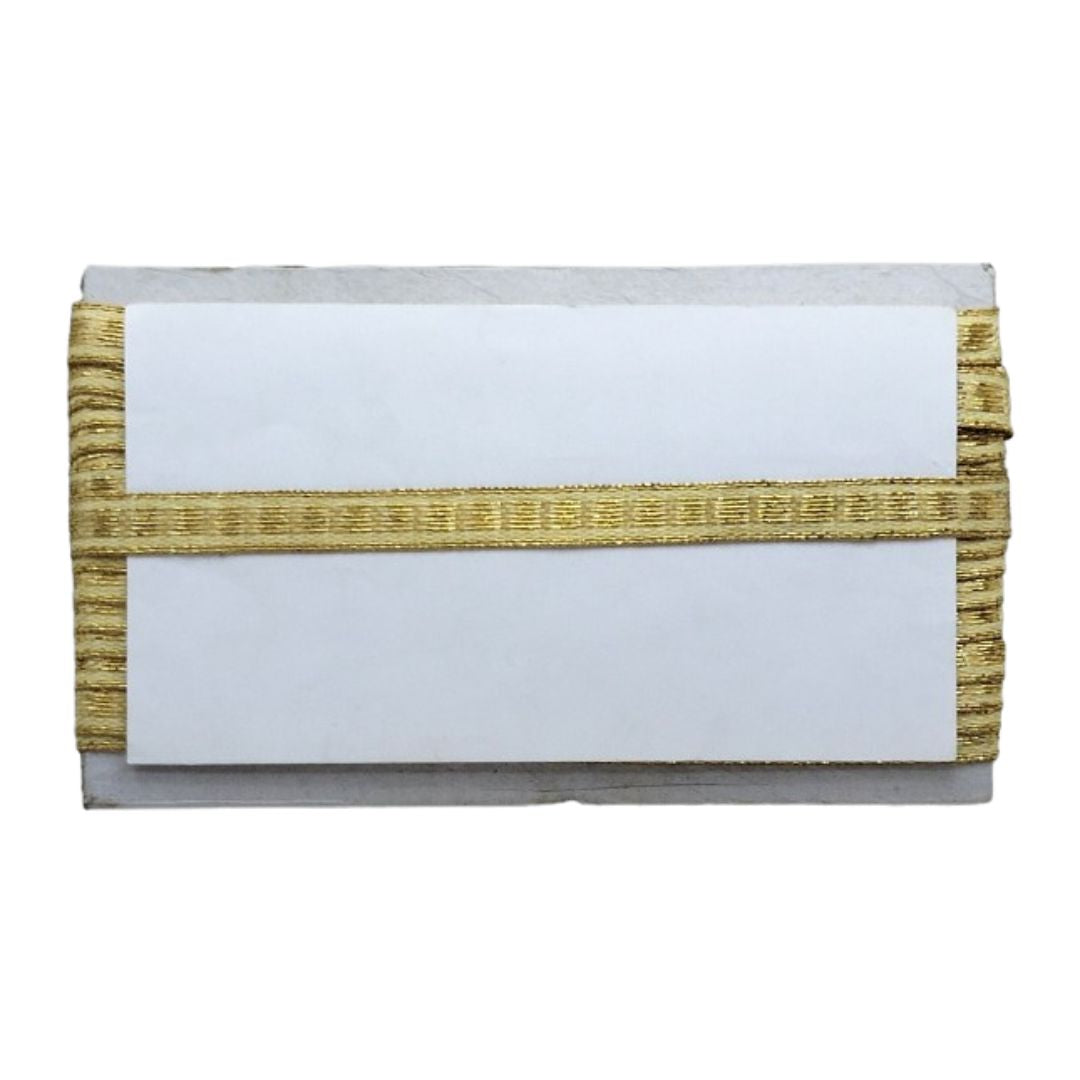 White clutch with gold woven strap on a white background