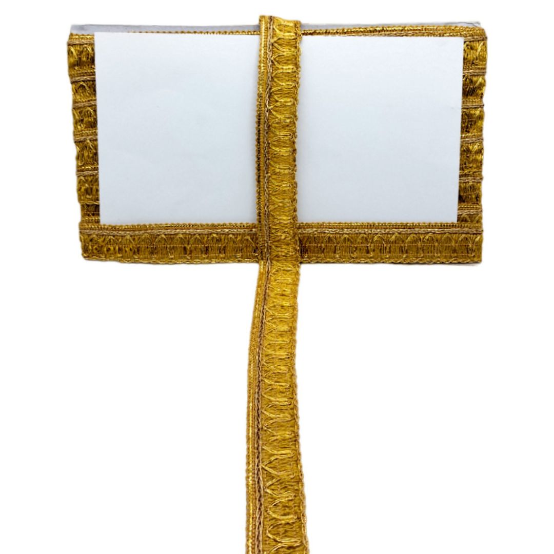 Gold decorative ribbon with a white center on a white background