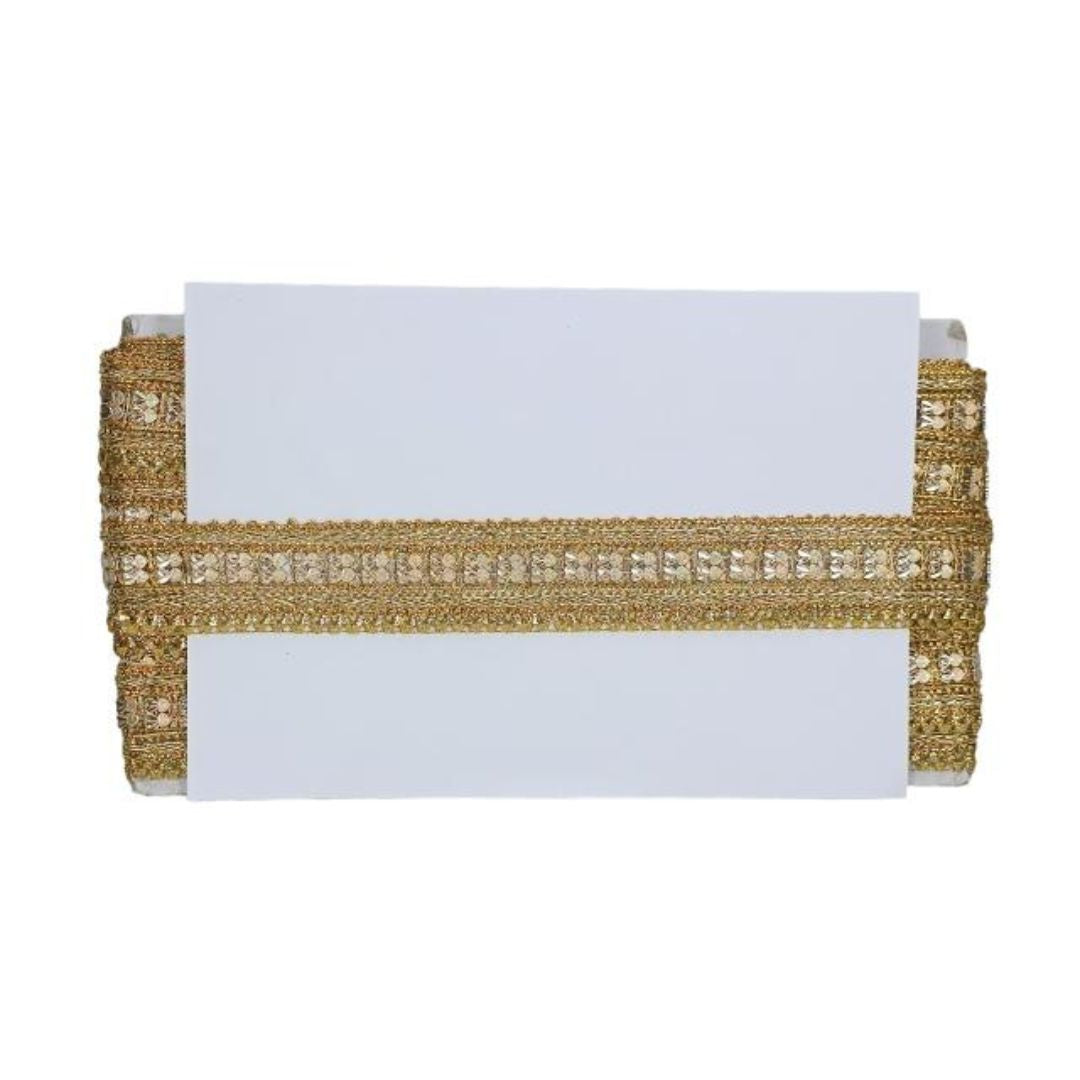 Gold decorative ribbon with a white card on a white background