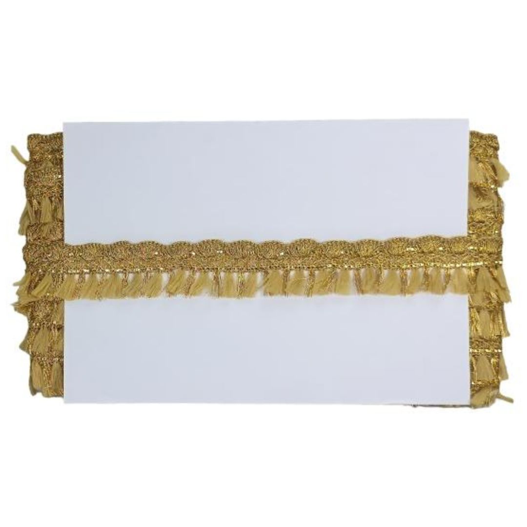 Gold fringe trim on a white background