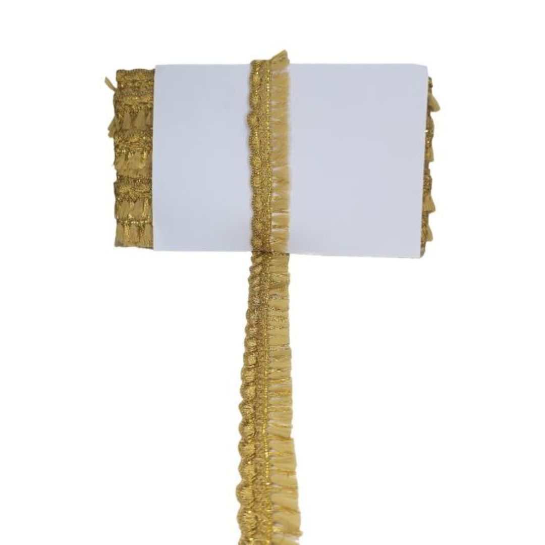 Gold ruffled table runner on a white background