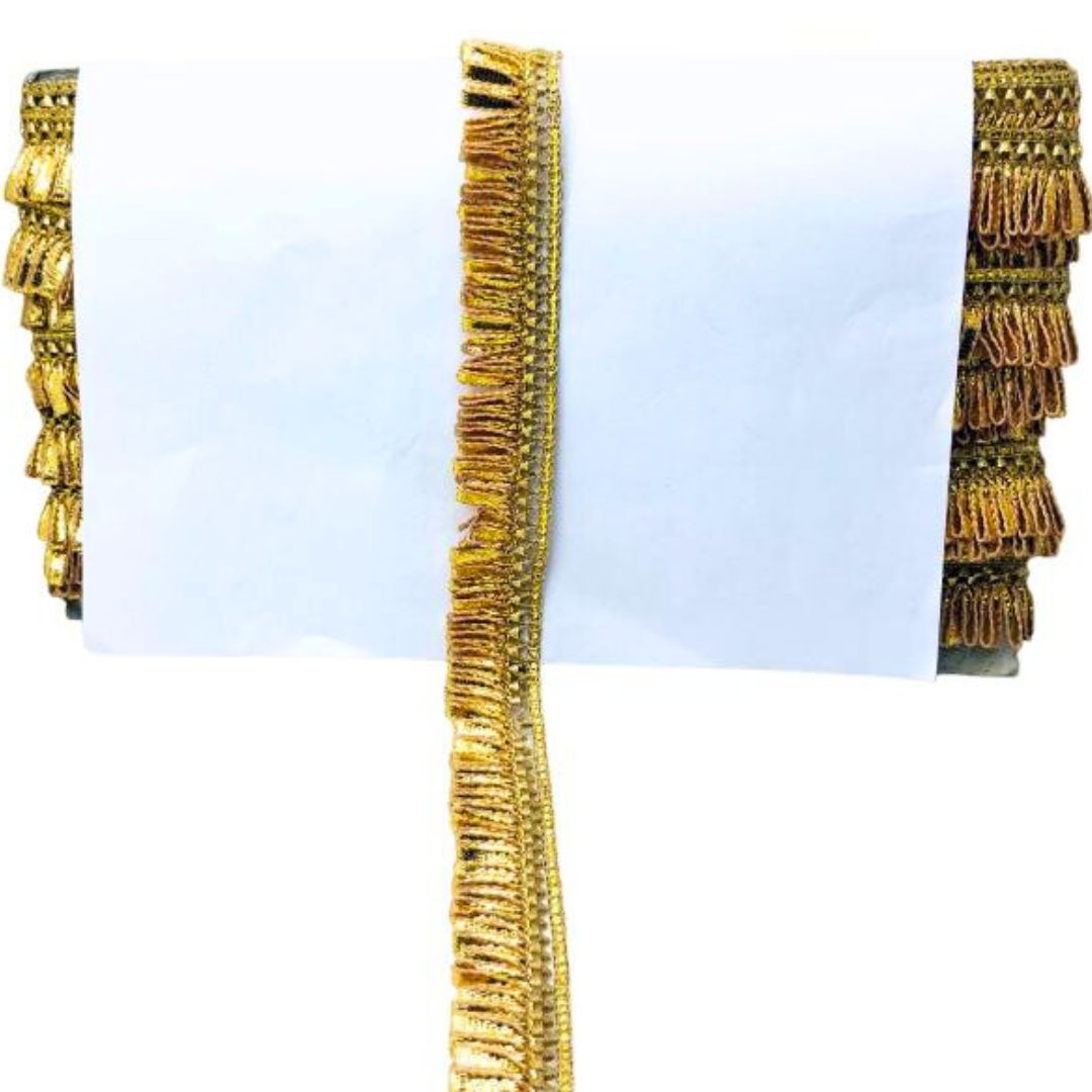 Gold bracelet with tiered design on a white background