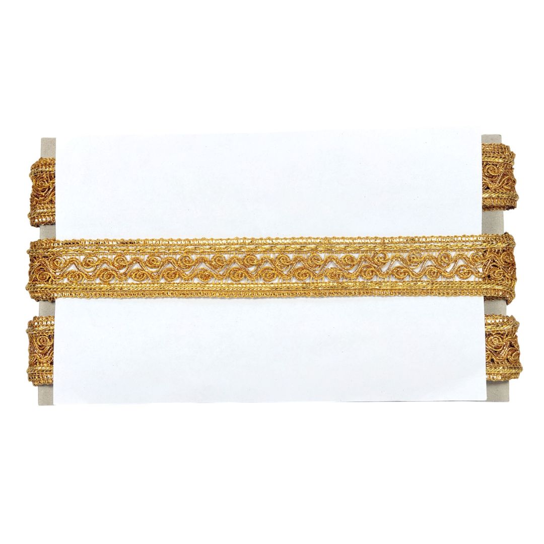 Decorative gold belt with intricate patterns on a white background