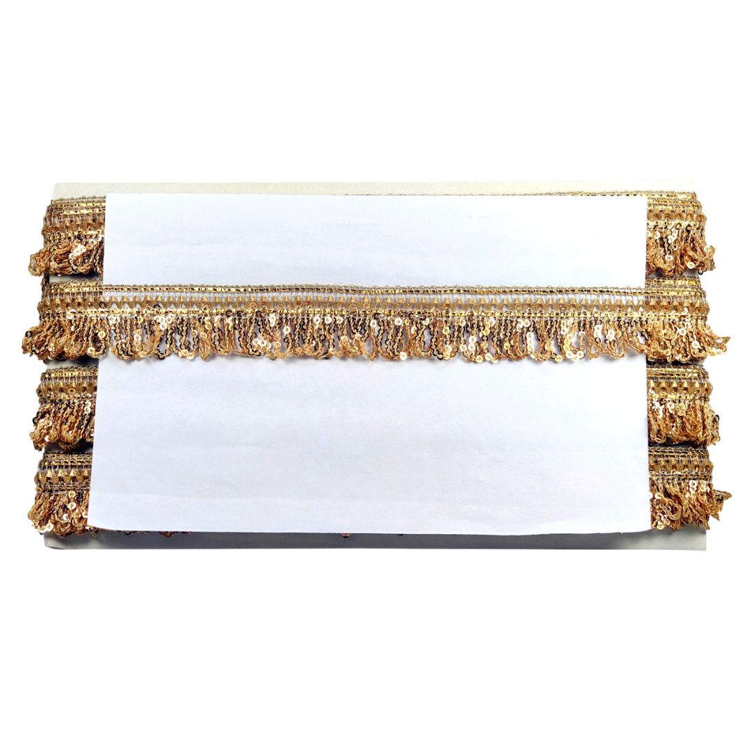 White clutch with gold decorative trim on a white background