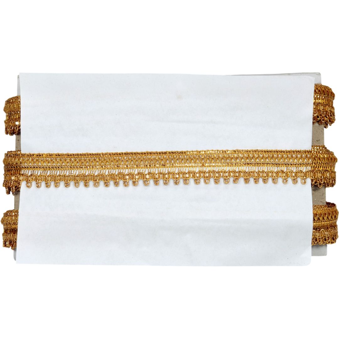 White clutch with gold fringe on a white background