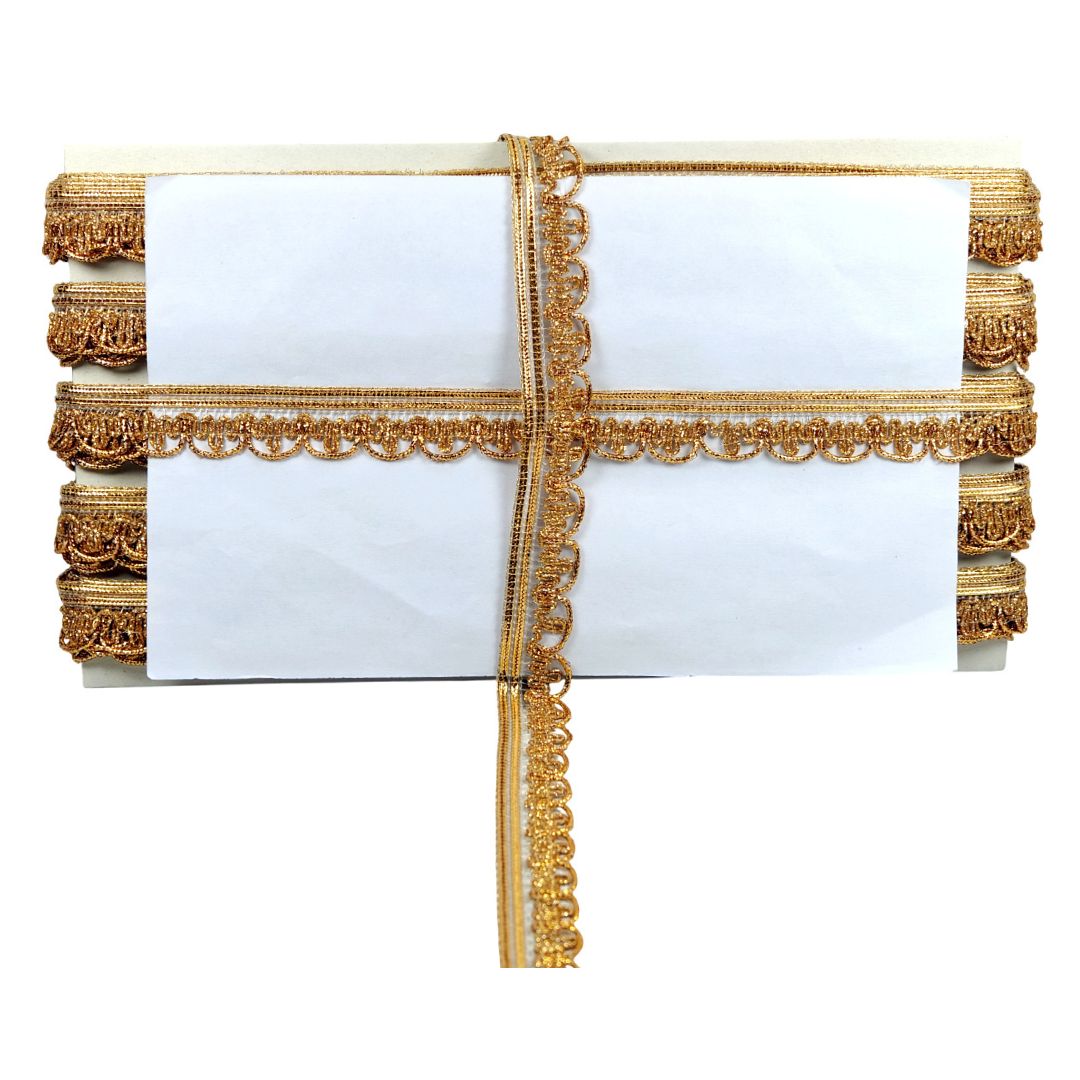 White clutch bag with gold decorative trim on a white background