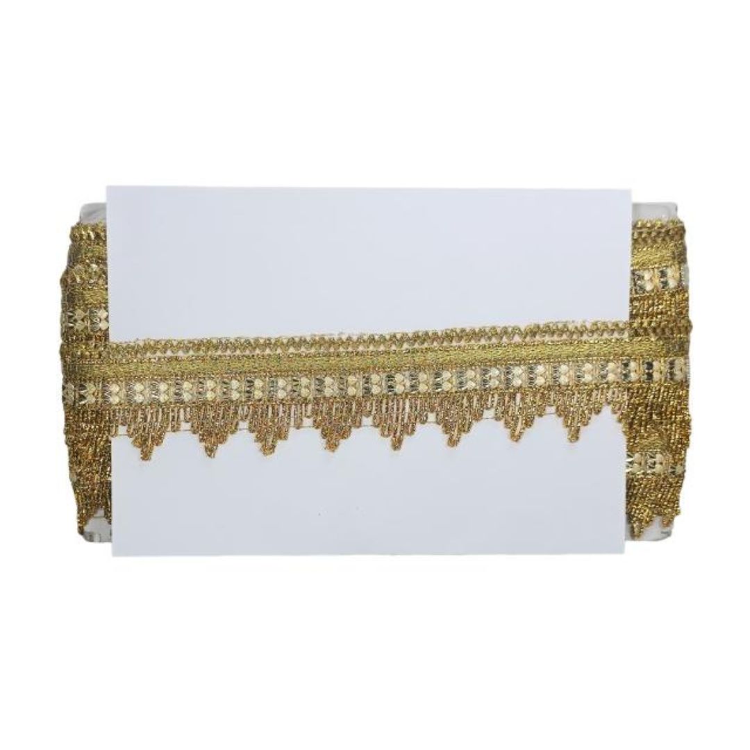 Gold fringe table runner on a white background