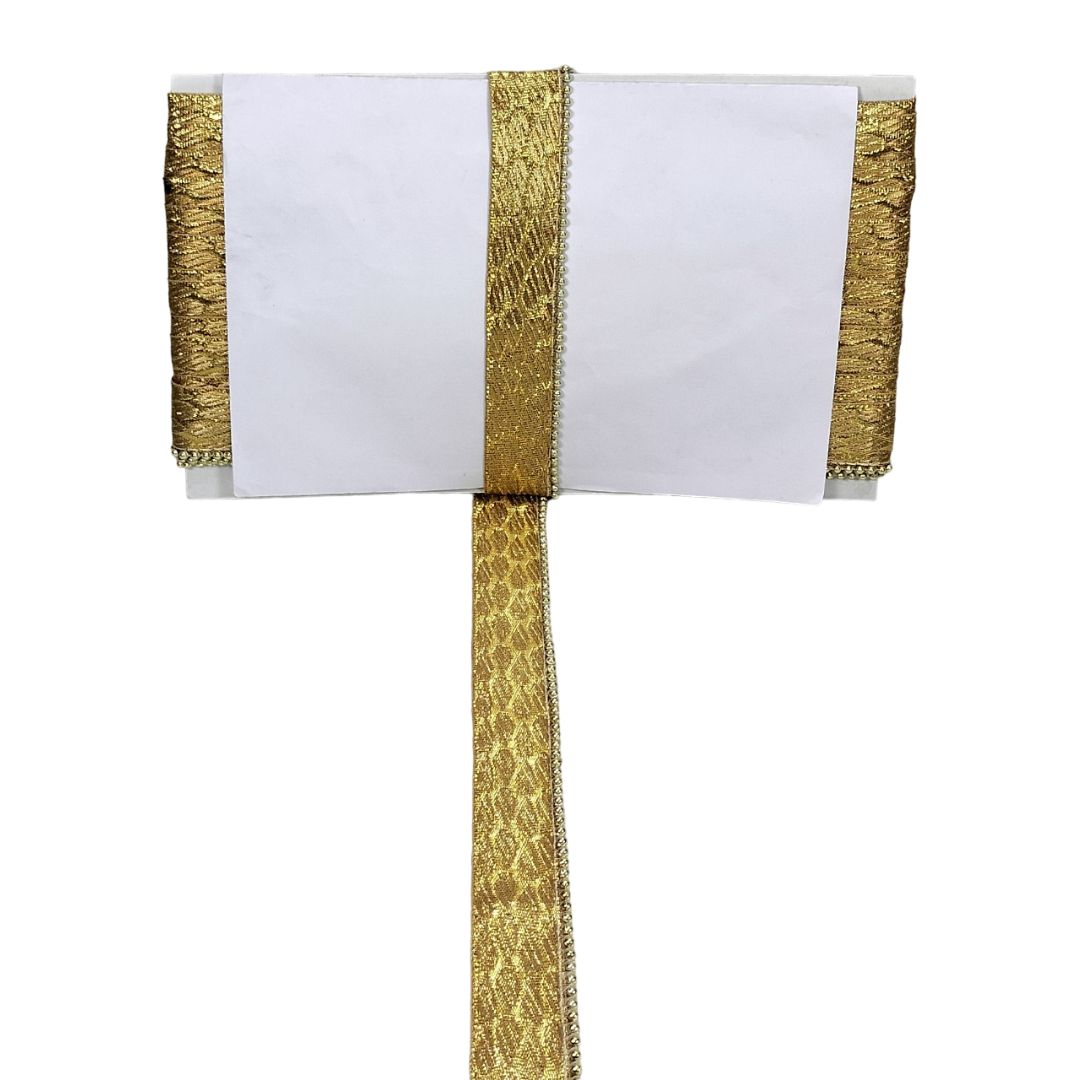White napkin with gold trim on a white background