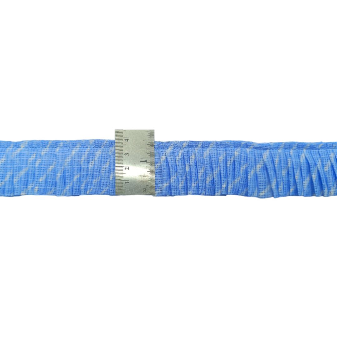 Blue woven belt with a metal ruler for scale on a white background