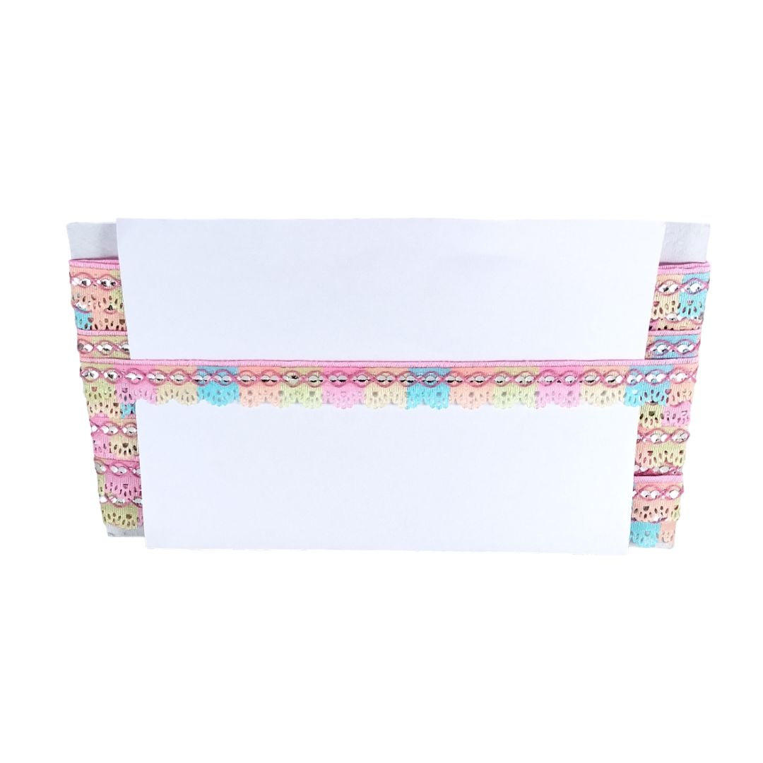 White underwear with colorful patterned waistband on a white background