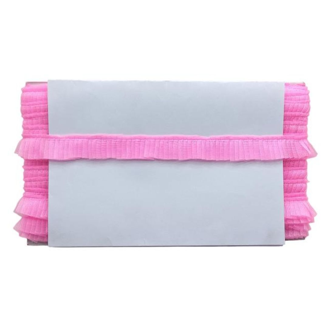 Pink ruffled clutch bag on a white background