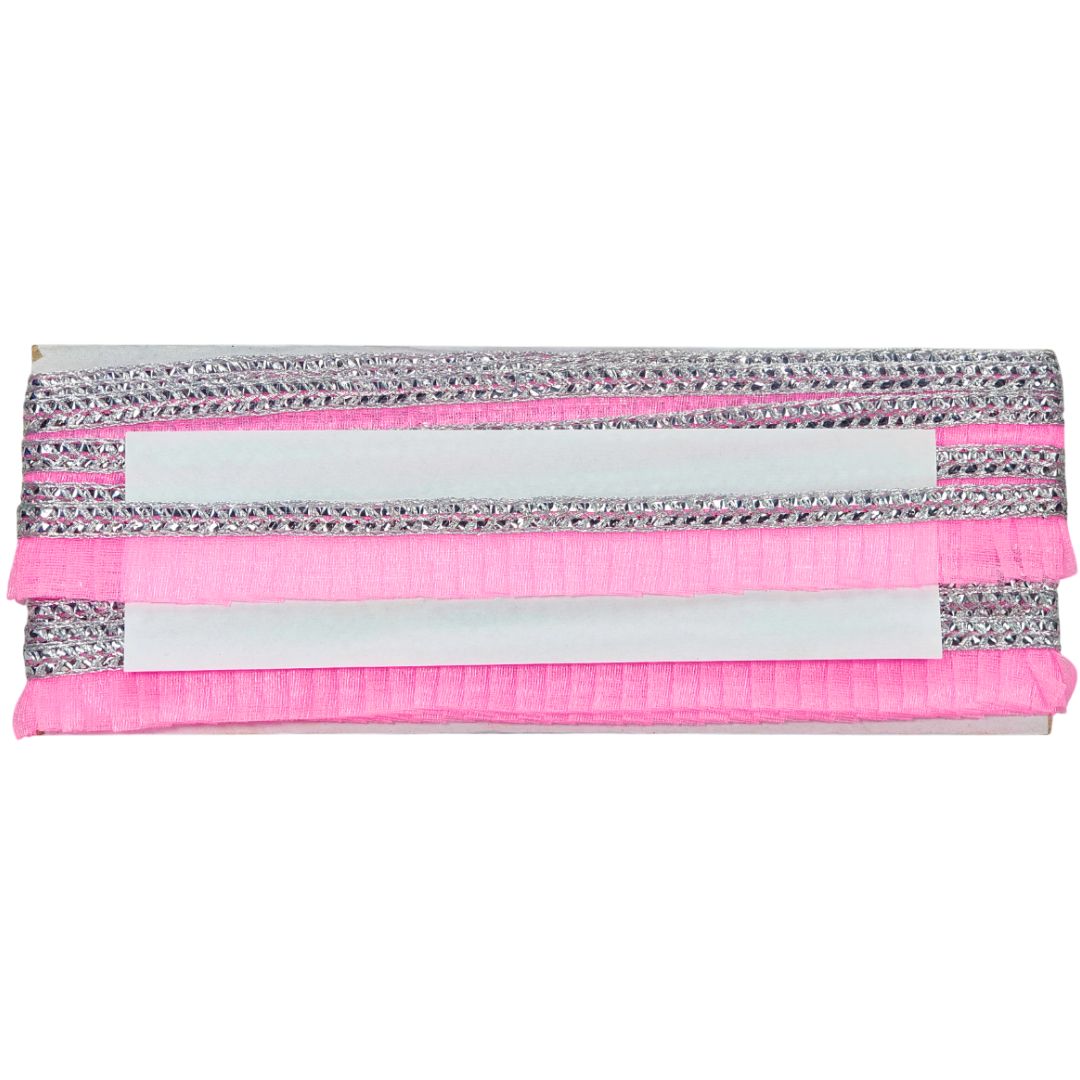 Pink and silver clutch bag on a white background