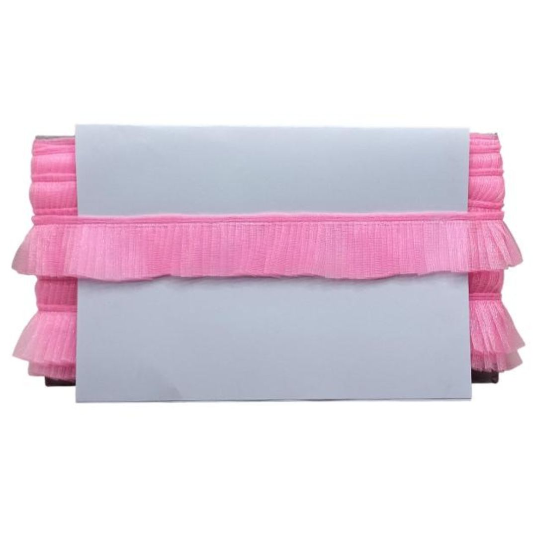 Pink ruffled clutch bag on a white background