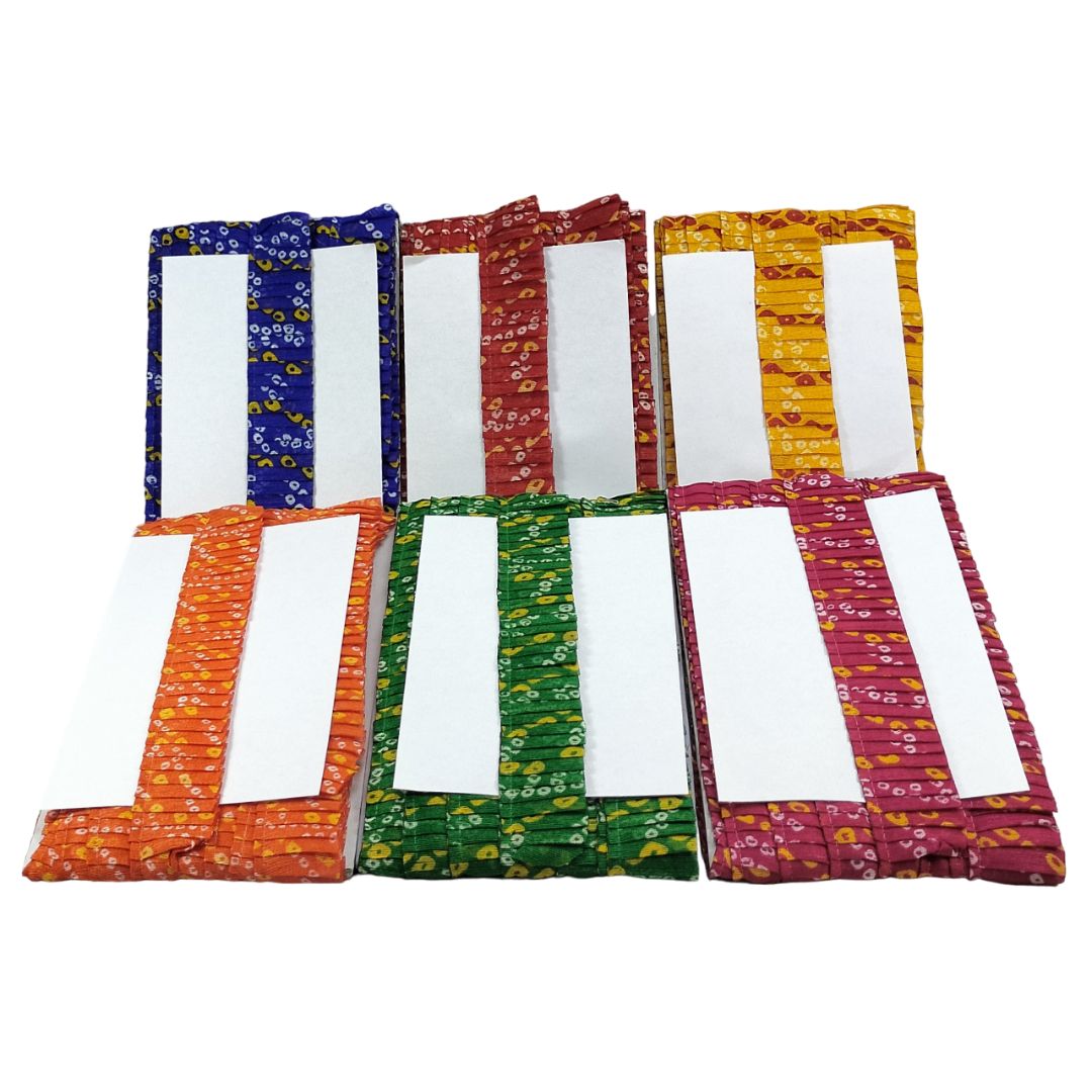 Set of colorful fabric bookmarks with white centers on a white background