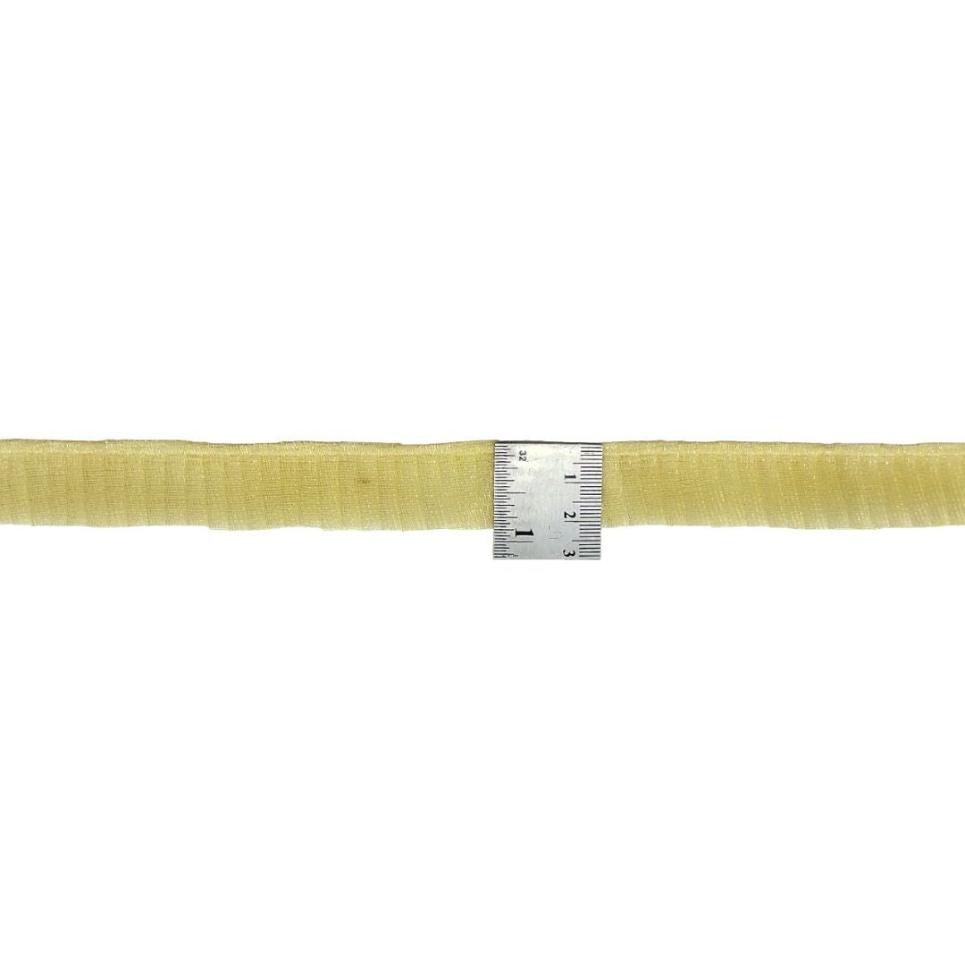 Yellow belt with a silver ruler on a white background
