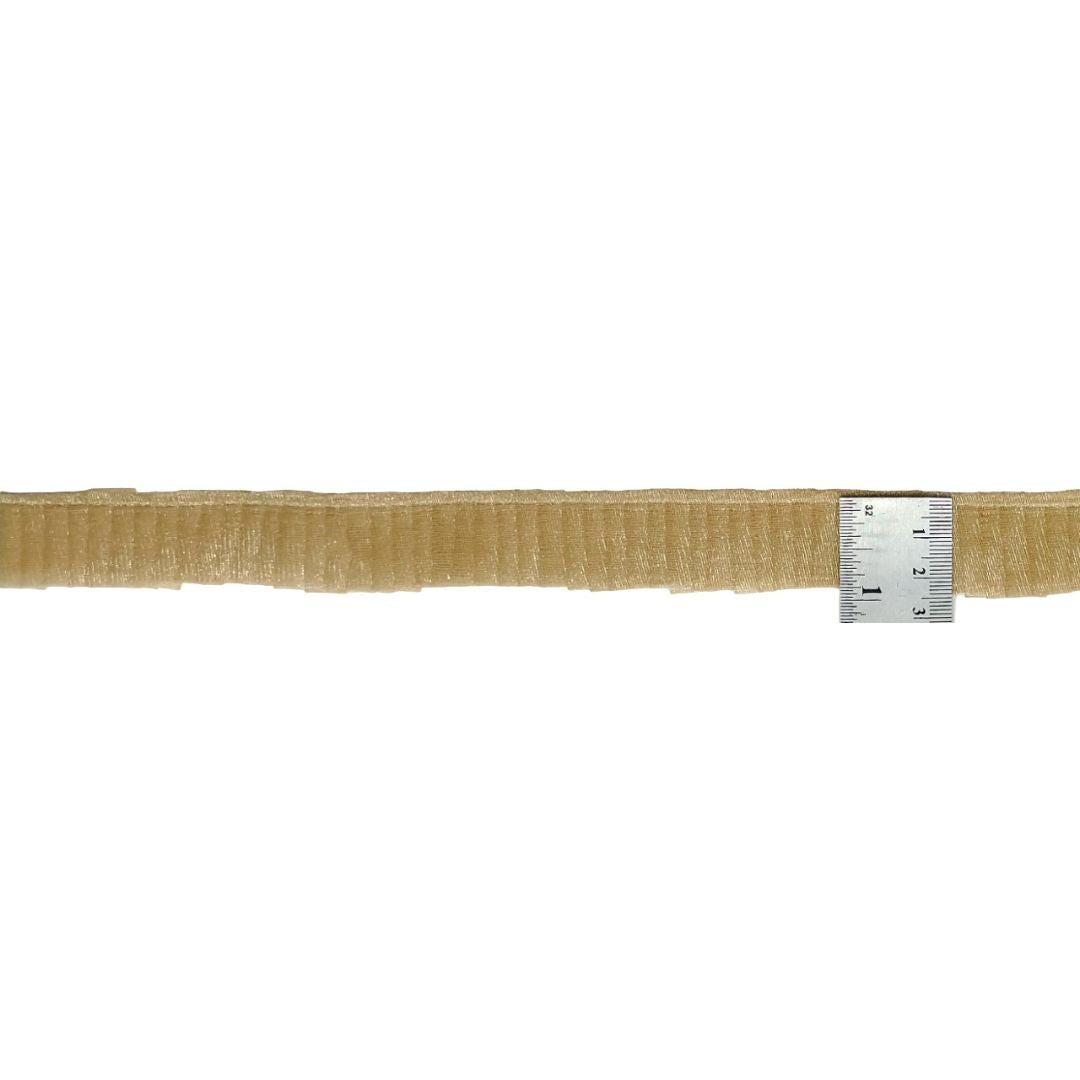 Beige belt with a metal buckle on a white background