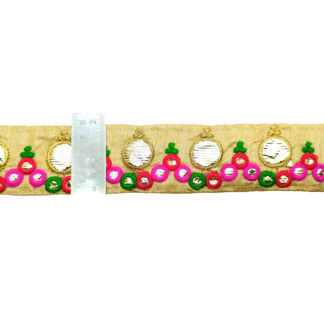 Decorative ribbon with circular patterns and colorful elements on a white background