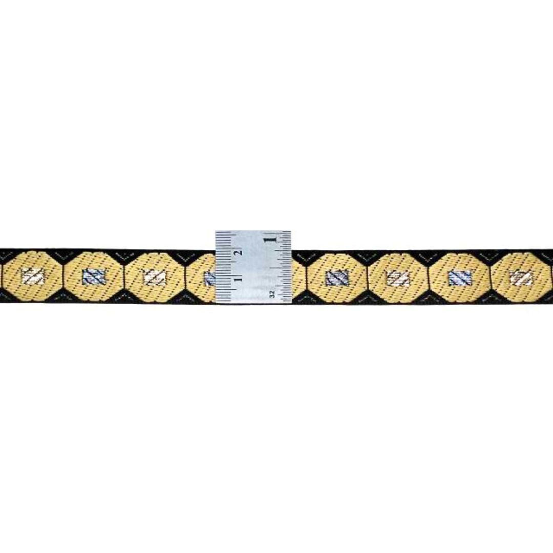 Measuring tape with black and gold hexagonal pattern on a white background