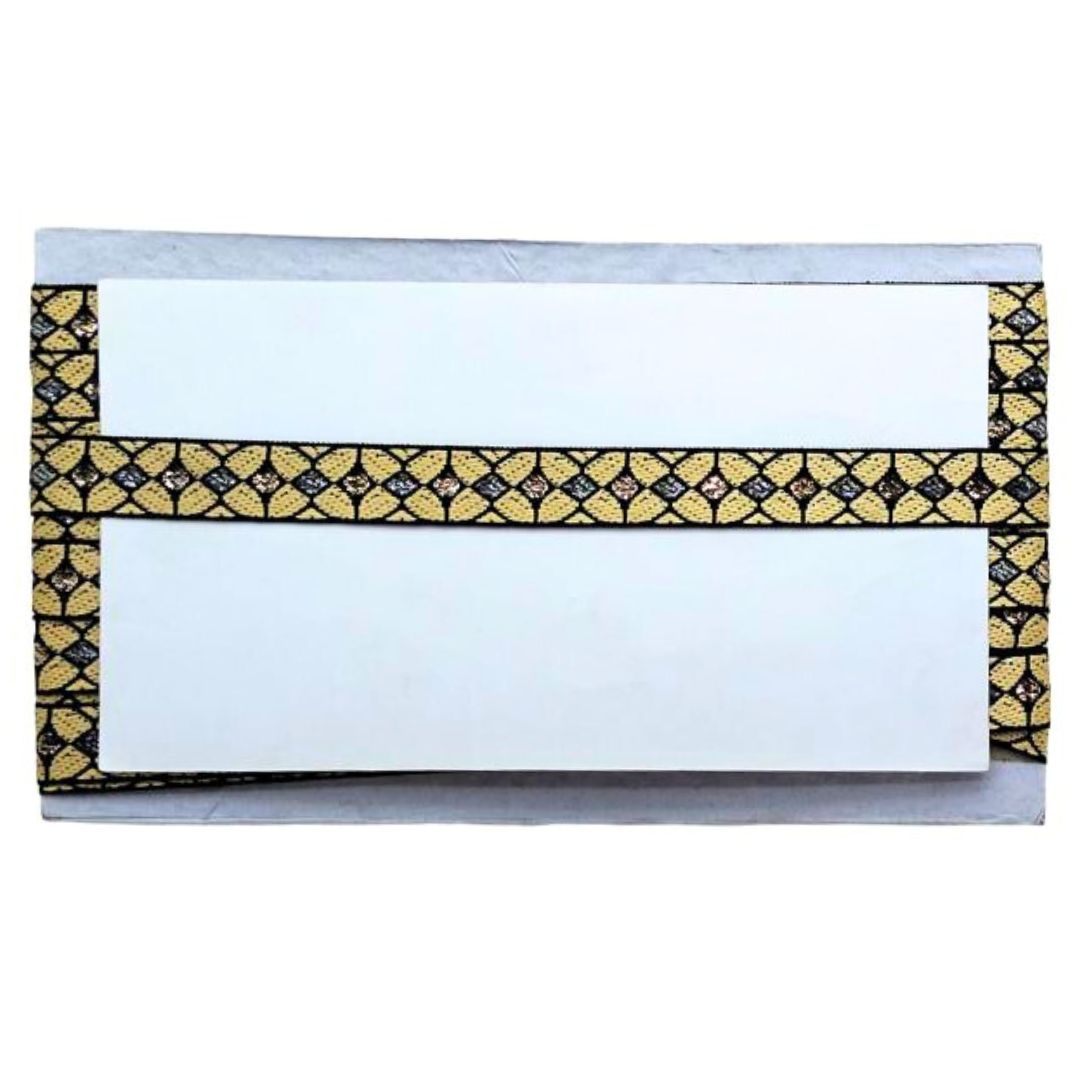 White envelope with gold and black decorative border on a white background