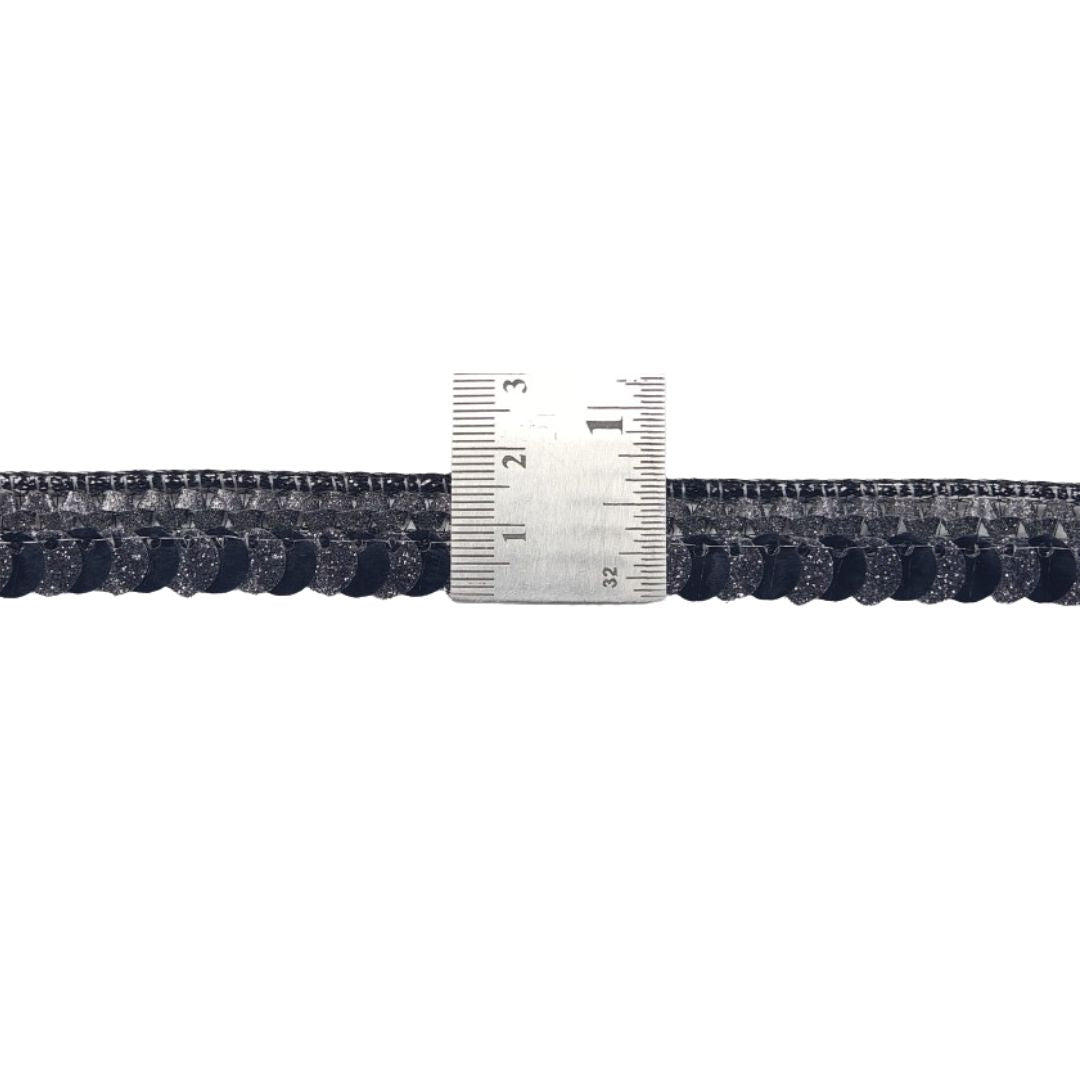 Measurement of a belt with a ruler on a white background