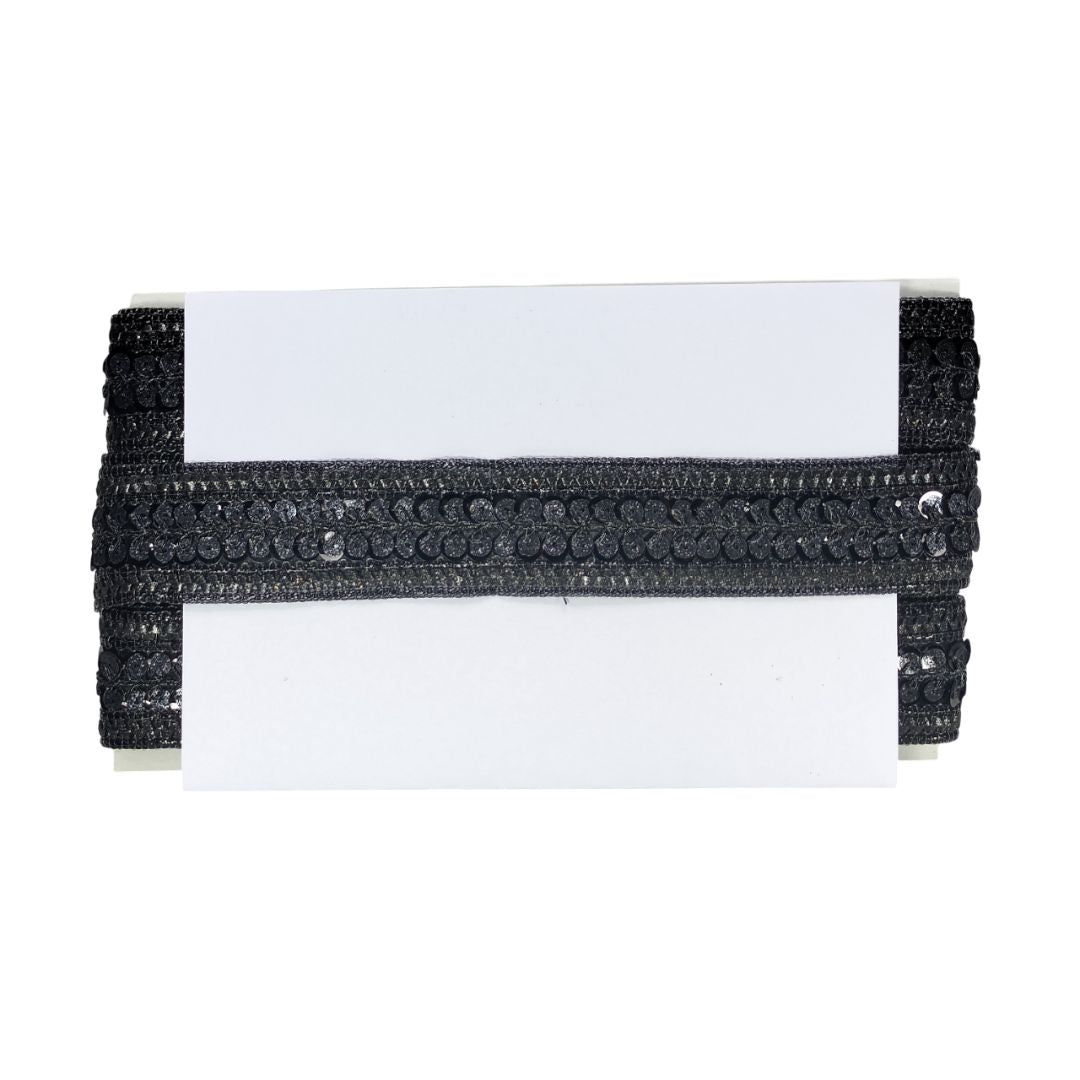 Black beaded clutch on a white background