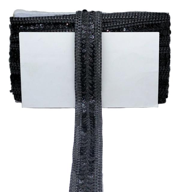 Black woven strap with a white card holder on a white background