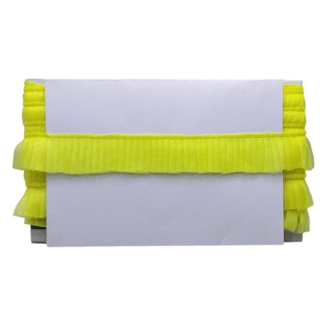 Clutch bag with yellow ruffled trim on a white background