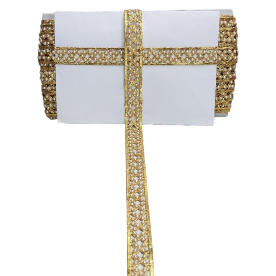 Gold decorative ribbon with white center on a white background