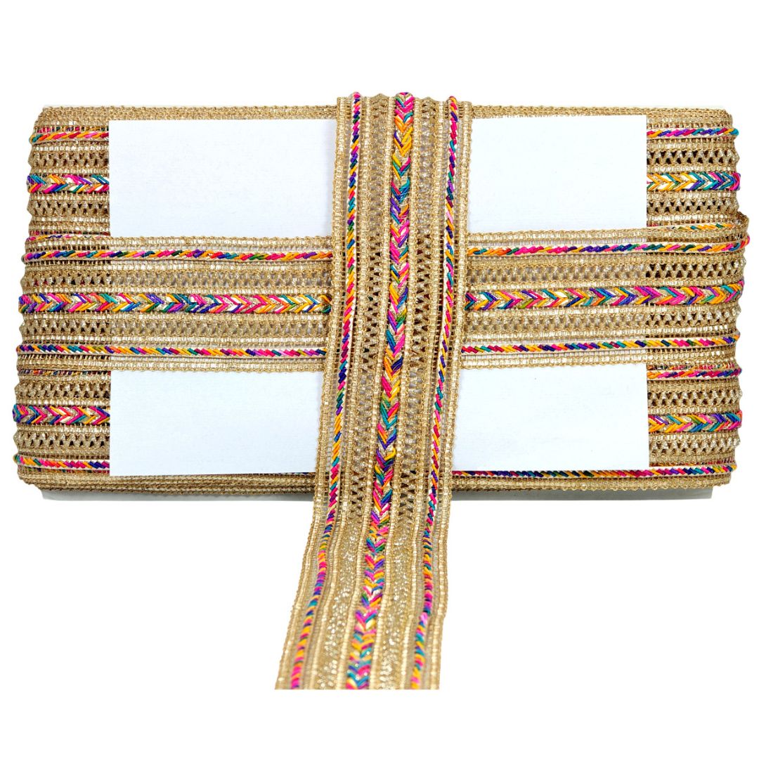 Clutch bag with colorful braided straps on a white background