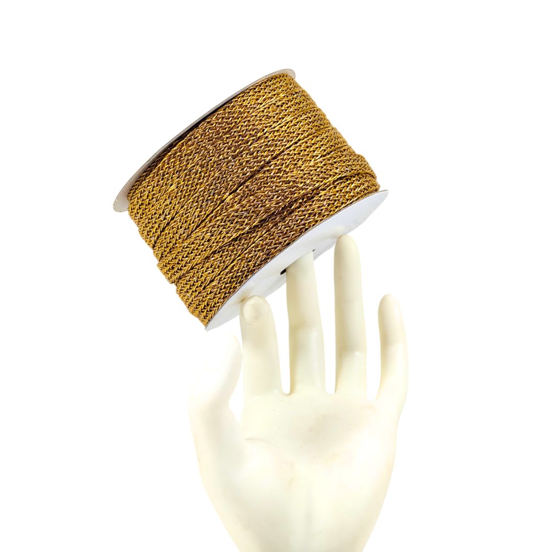 Gold braided cord on a white background