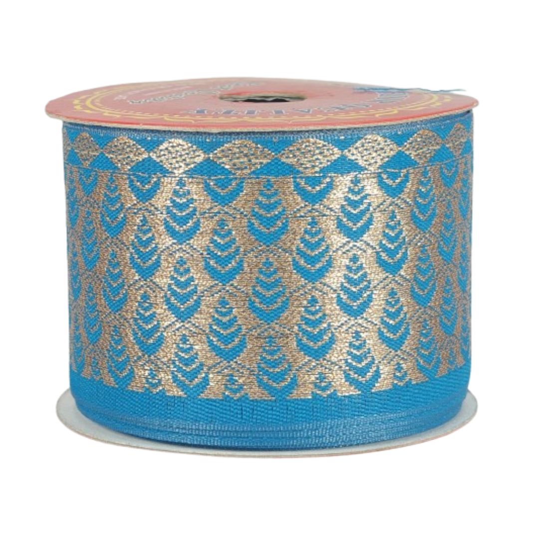 Roll of blue and gold patterned ribbon on a white background