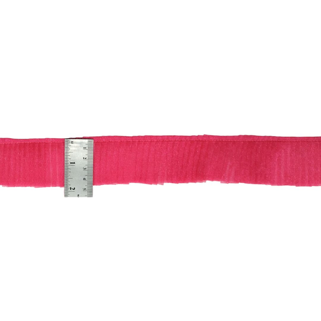 Pink belt with a silver ruler on a white background