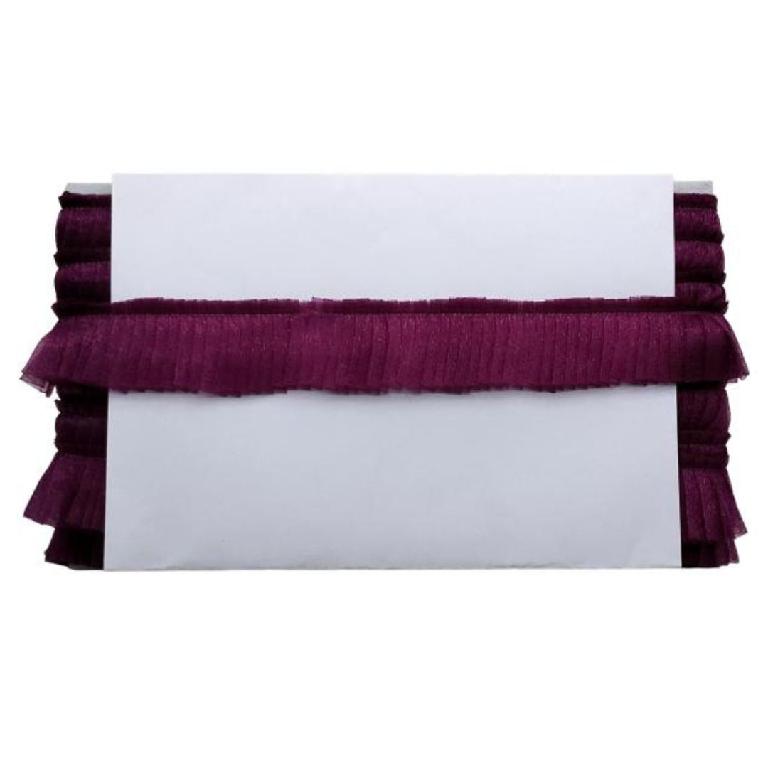 White card with purple ruffled border on a white background