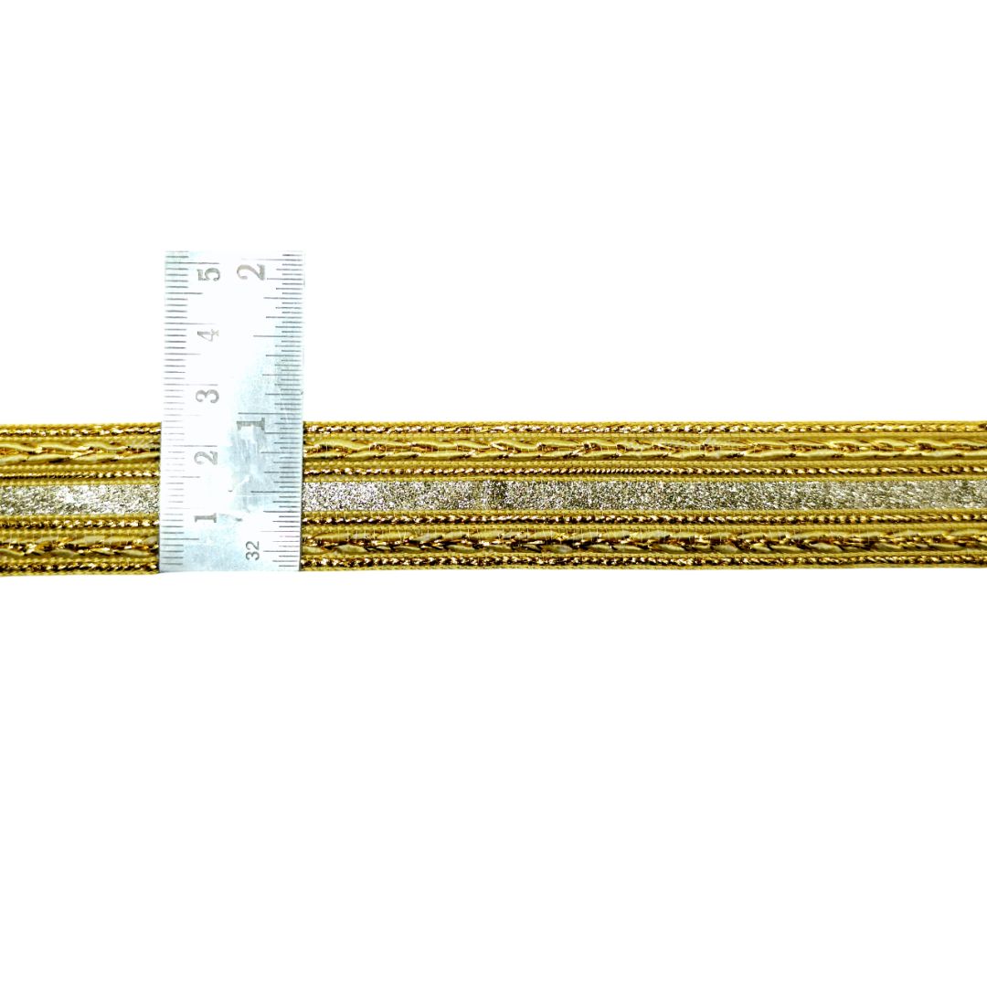 Gold and silver braided cord with a ruler for scale on a white background