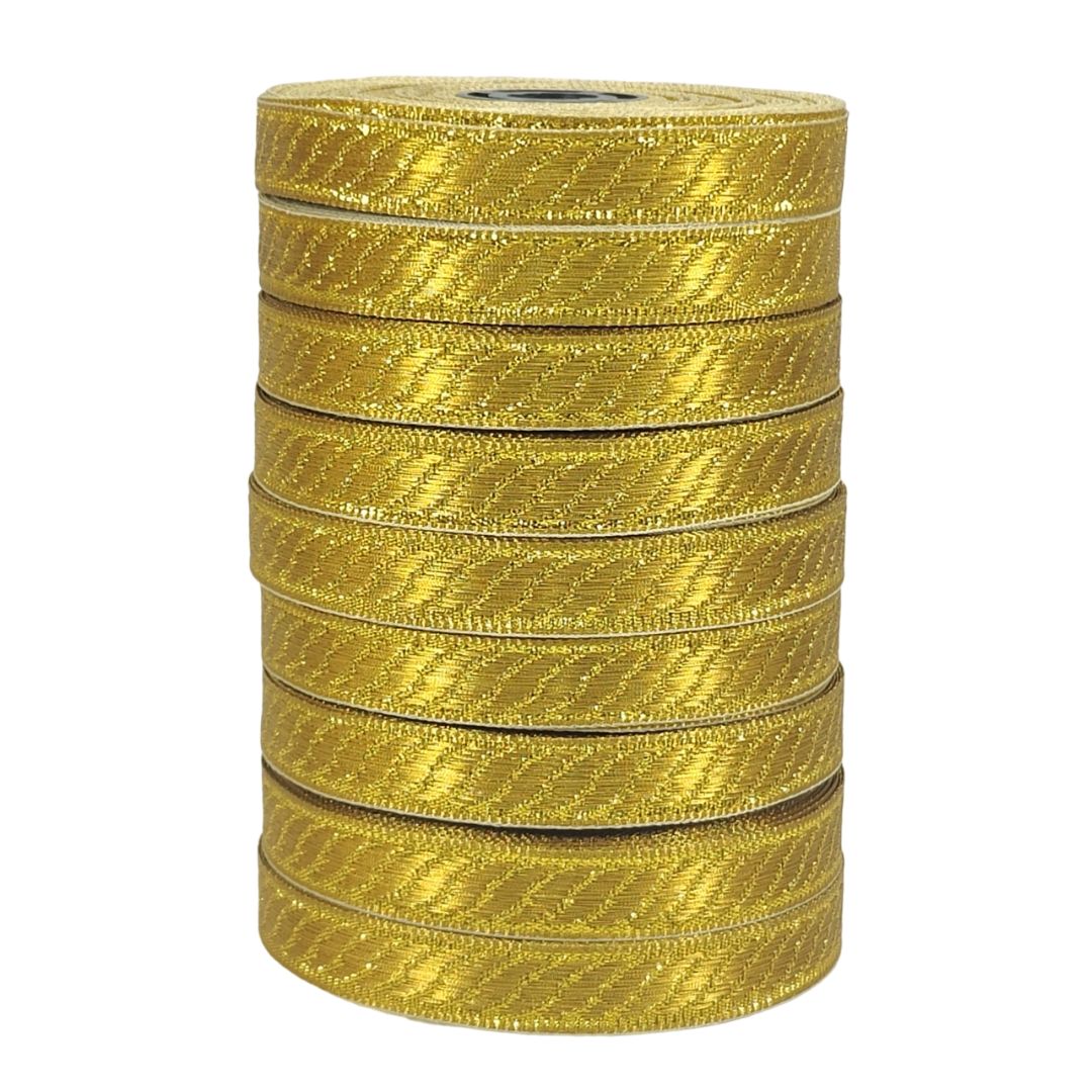 Stack of gold ribbons on a white background