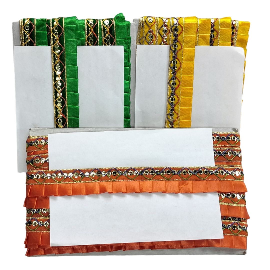 Set of white napkins with colorful decorative borders in green, yellow, and orange on a white background.