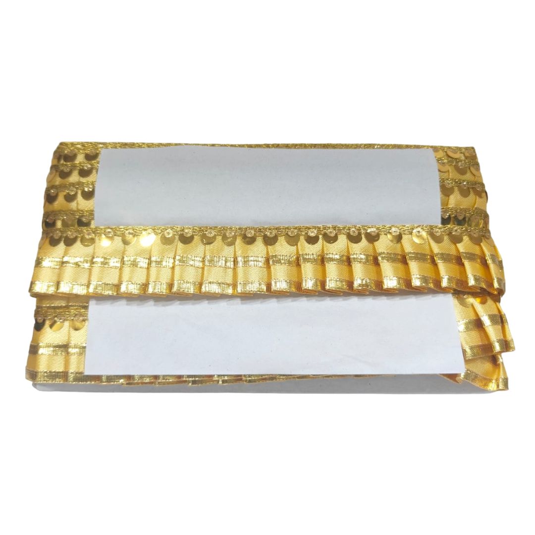Two gold-wrapped white bars of chocolate on a white background