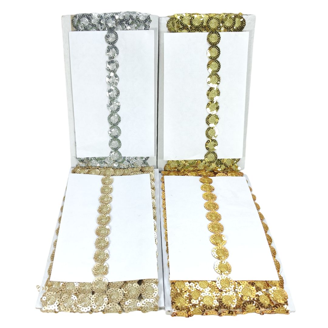 Decorative chair covers with gold and silver embellishments on a white background