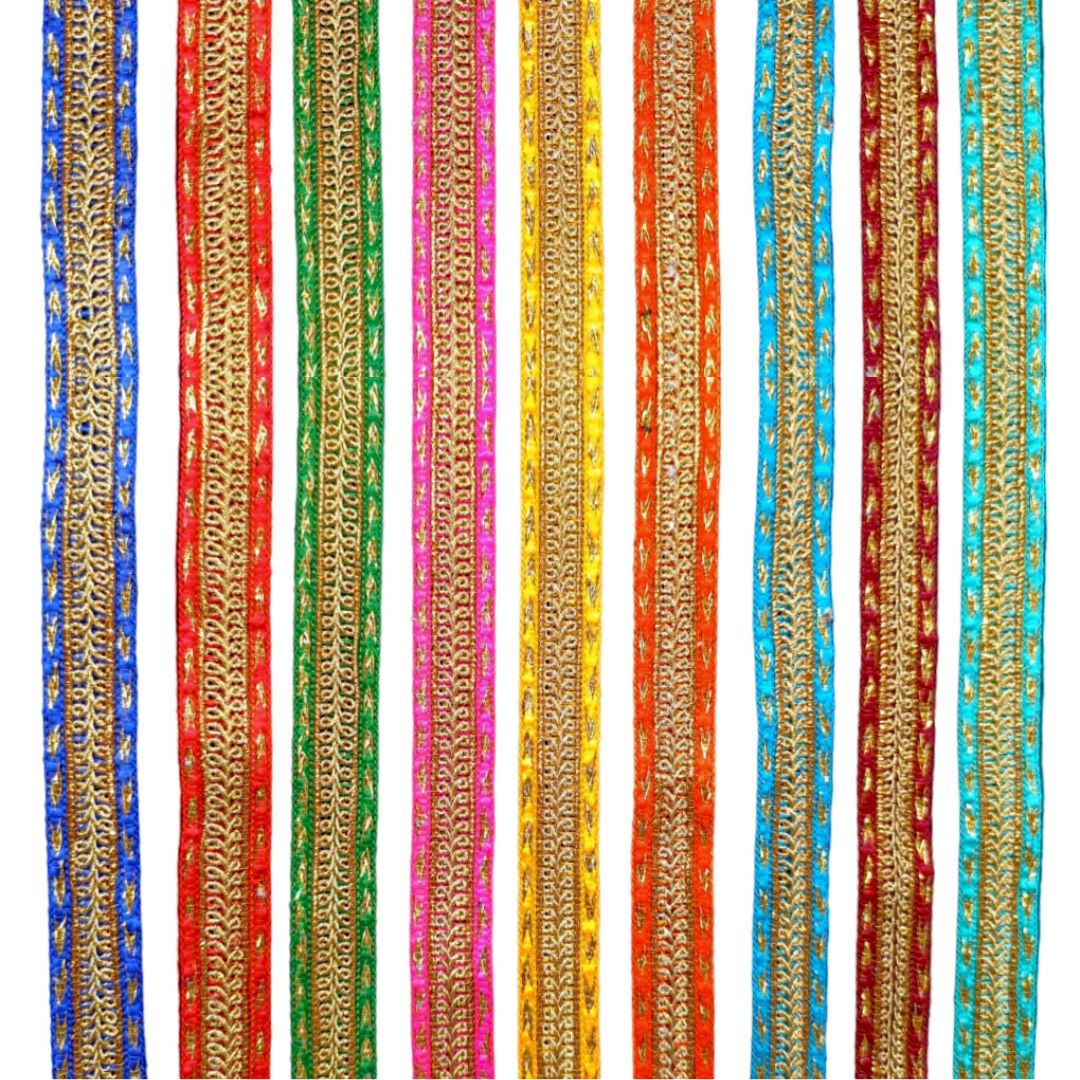 Set of colorful ribbons with gold patterns on a white background