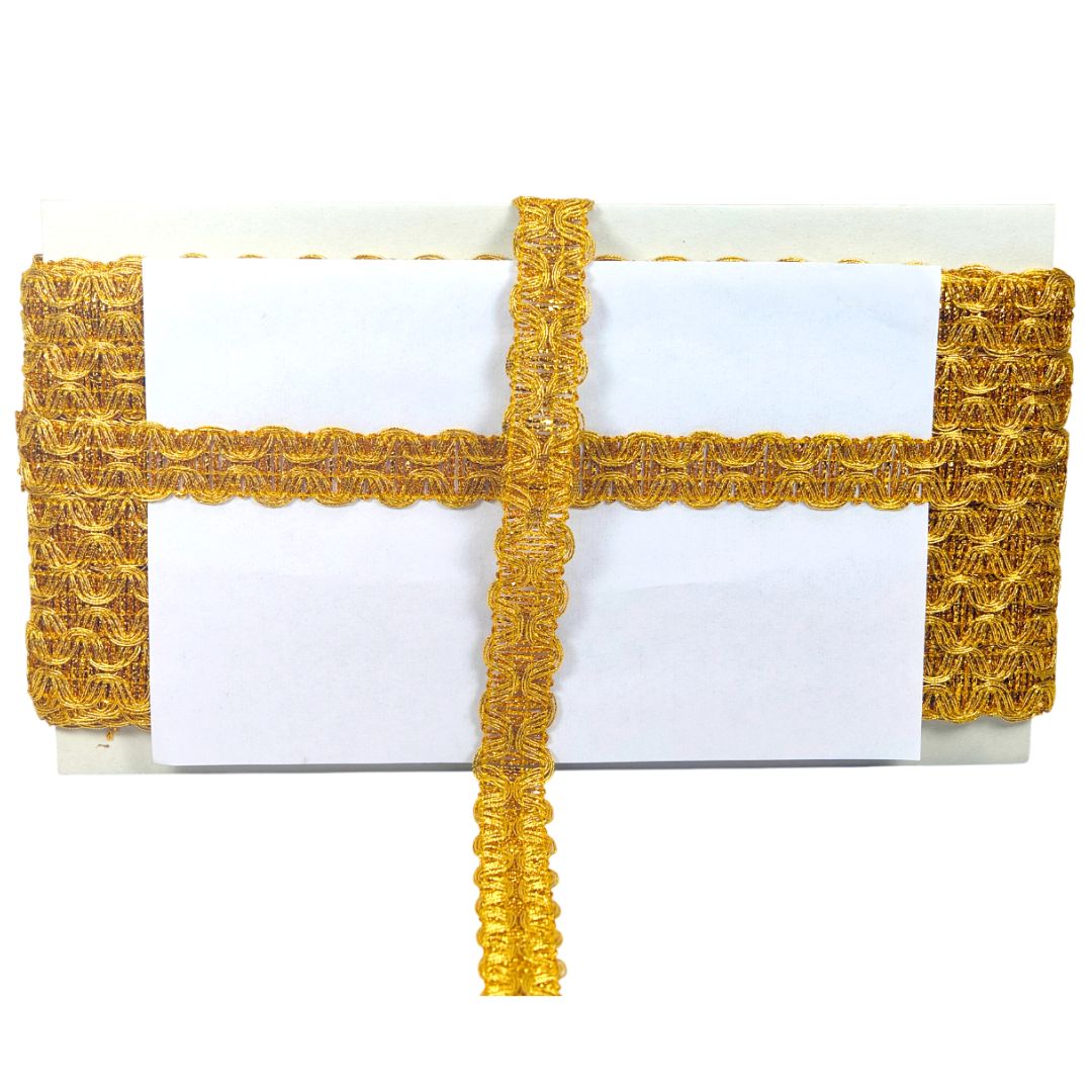 Gold lace trim on a white background