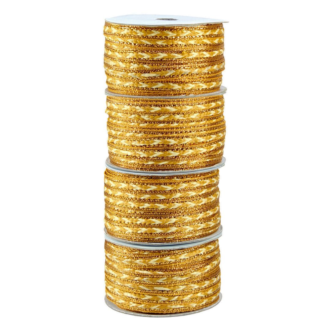 Gold bangles stacked on a white background