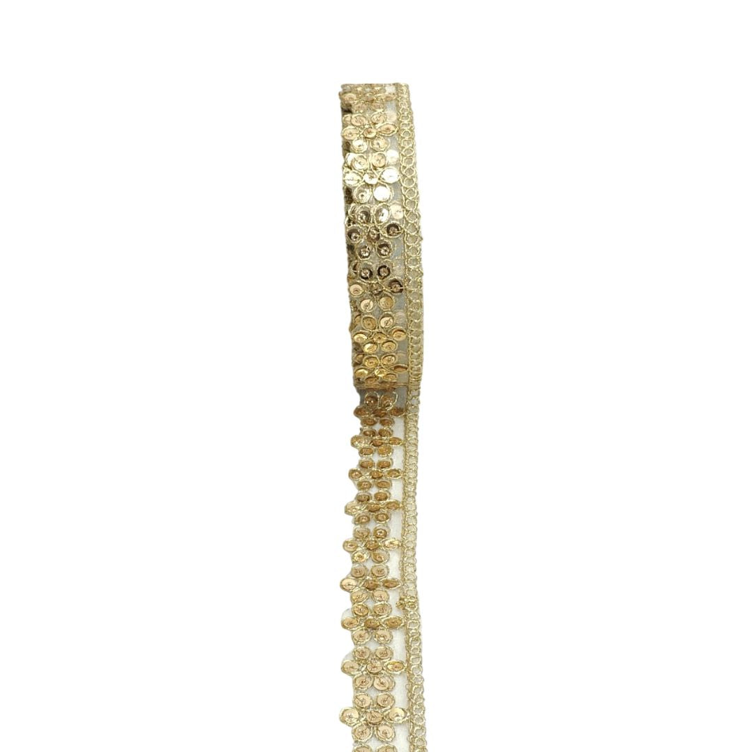 Gold decorative ribbon on a white background