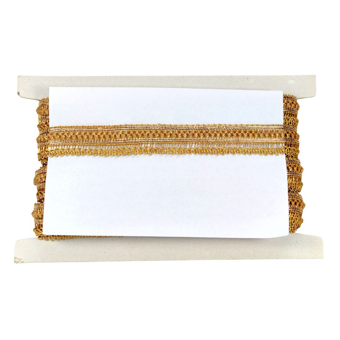 Decorative shelf with gold trim on a white background